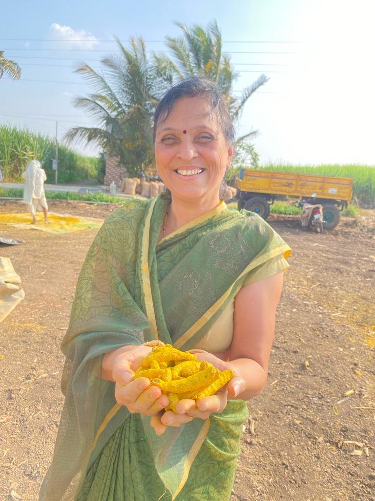 farmer with turmeric