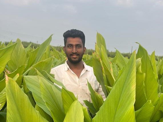 farmer with turmeric